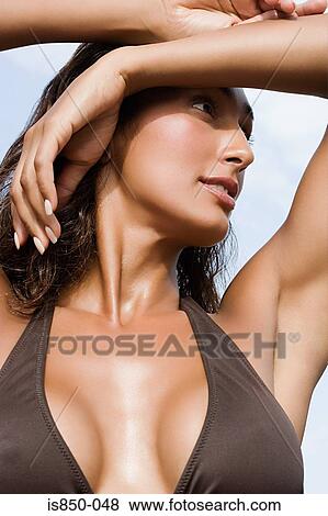 Woman shielding face View Large Photo Image Stock Photo - Woman shielding face. Fotosearch