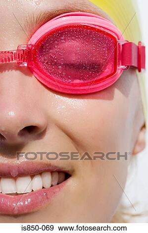 Woman wearing swimming goggles View Large Photo Image Stock Photo - Woman wearing swimming goggles. Fotosearch