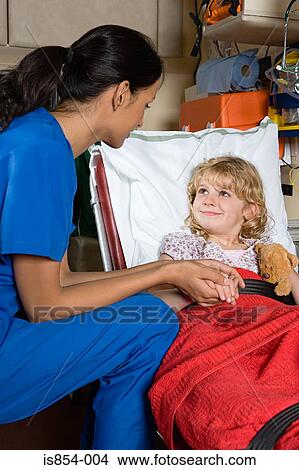 Doctor and child in ambulance View Large Photo Image Picture - Doctor and child in ambulance. Fotosearch
