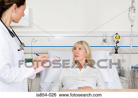Doctor and patient View Large Photo Image Stock Photograph - Doctor and patient. Fotosearch