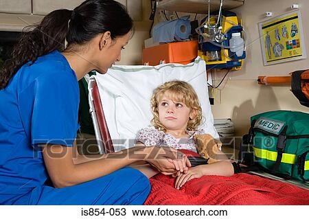 Girl and nurse in ambulance View Large Photo Image Stock Image - Girl and nurse in ambulance. Fotosearch