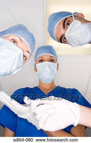 Stock Image - Surgeons. Fotosearch