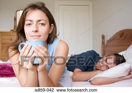 Woman holding cup View Large Photo Image Stock Image - Woman holding cup. Fotosearch