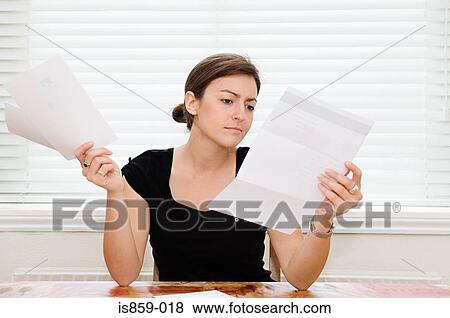 Woman reading letters View Large Photo Image Stock Photo - Woman reading letters. Fotosearch