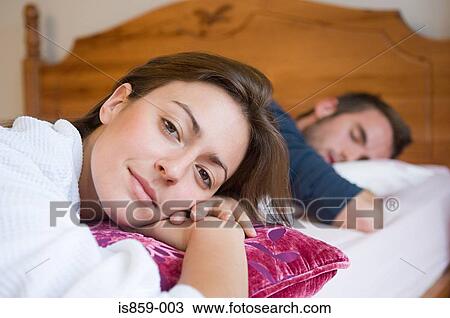 Woman waking up View Large Photo Image Stock Image - Woman waking up. Fotosearch