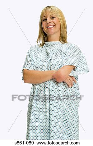 Stock Photo - Female amputee wearing hospital gown. Fotosearch