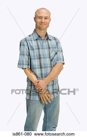 Stock Image - Portrait of a man with an artificial arm. Fotosearch