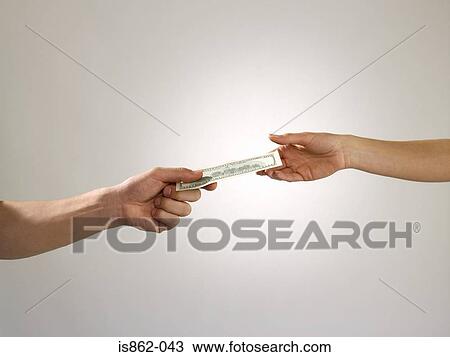 Man passing banknote to woman View Large Photo Image Stock Image - Man passing banknote to woman. Fotosearch