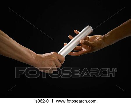 Passing a baton View Large Photo Image Stock Image - Passing a baton. Fotosearch