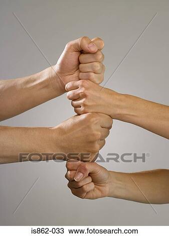 People putting fists together View Large Photo Image Stock Image - People putting fists together. Fotosearch