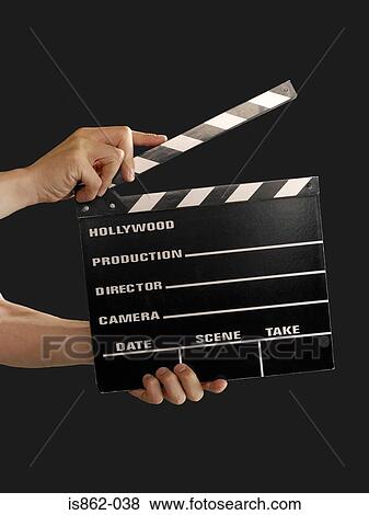 Person with a clapperboard View Large Photo Image Stock Photo - Person with a clapperboard. Fotosearch