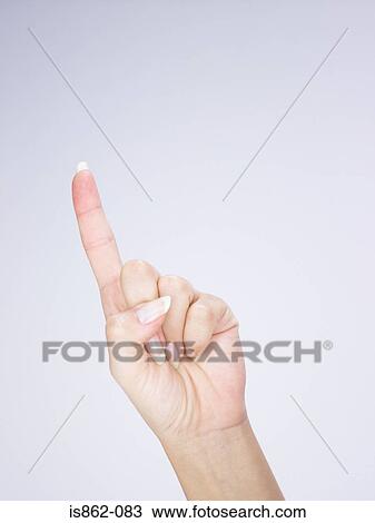 Woman pointing upwards View Large Photo Image Stock Image - Woman pointing upwards. Fotosearch
