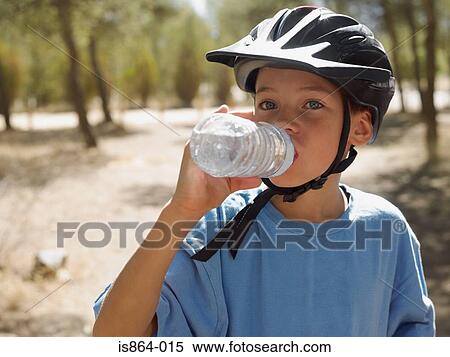 Boy drinking water View Large Photo Image Stock Photography - Boy drinking water. Fotosearch
