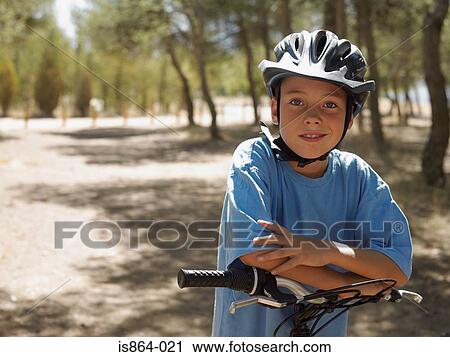 Boy with bike View Large Photo Image Stock Image - Boy with bike. Fotosearch