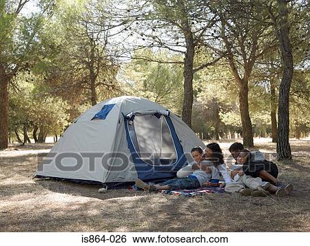 Family by tent View Large Photo Image Stock Photograph - Family by tent. Fotosearch