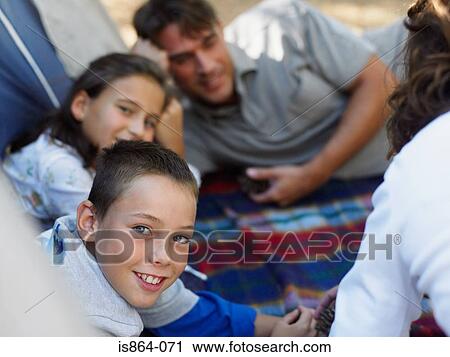 Family on a blanket View Large Photo Image Stock Image - Family on a blanket. Fotosearch
