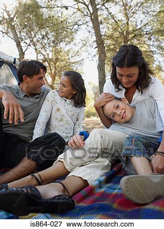 Family on a blanket View Large Photo Image Stock Photo - Family on a blanket. Fotosearch