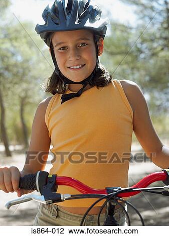 Girl with bike View Large Photo Image Stock Image - Girl with bike. Fotosearch