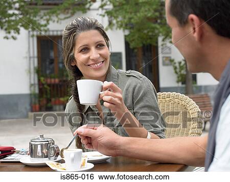 Couple having coffee View Large Photo Image Stock Photograph - Couple having coffee. Fotosearch