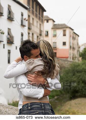 Couple hugging View Large Photo Image Stock Image - Couple hugging. Fotosearch