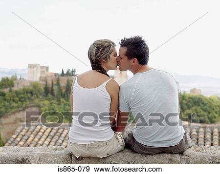 Couple kissing near alhambra View Large Photo Image Stock Photo - Couple kissing near alhambra. Fotosearch