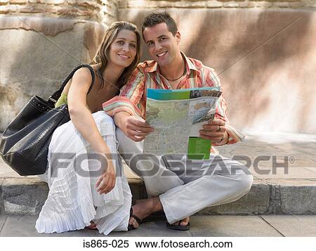 Couple with a map View Large Photo Image Stock Photography - Couple with a map. Fotosearch