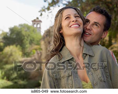 Stock Photo - Man with head on womans shoulder. Fotosearch