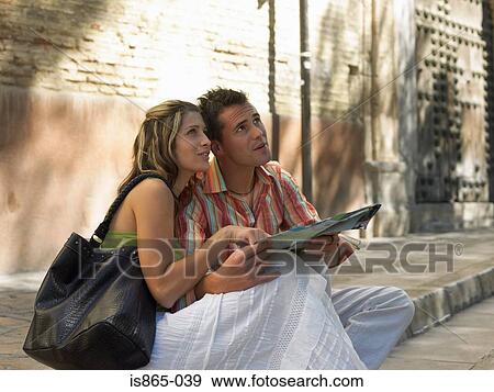 Tourist couple View Large Photo Image Stock Photo - Tourist couple. Fotosearch