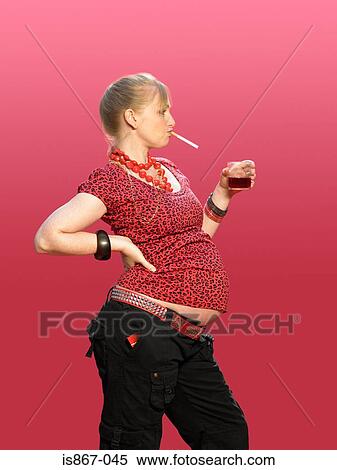 Pregnant woman smoking and drinking View Large Photo Image Stock Photography - Pregnant woman smoking and drinking. Fotosearch