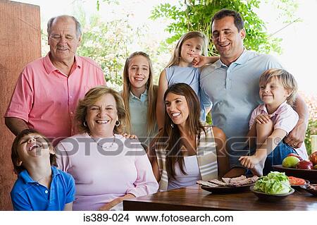 Picture - Family at lunch. Fotosearch
