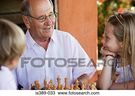 Grandfather with grandchildren View Large Photo Image Stock Image - Grandfather with grandchildren. Fotosearch
