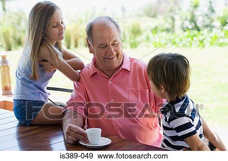Grandfather with grandchildren View Large Photo Image Stock Photo - Grandfather with grandchildren. Fotosearch