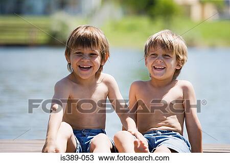 Two boys on vacation View Large Photo Image Stock Image - Two boys on vacation. Fotosearch