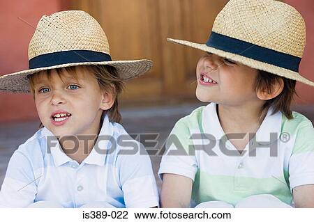 Two boys wearing panama hats View Large Photo Image Stock Image - Two boys wearing panama hats. Fotosearch