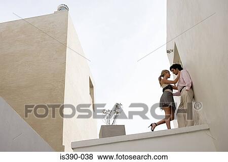 Couple hugging View Large Photo Image Stock Photo - Couple hugging. Fotosearch