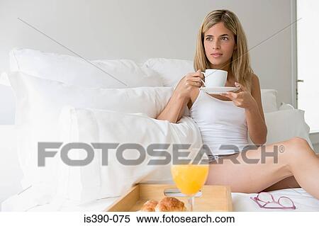 Woman holding coffee cup View Large Photo Image Stock Photography - Woman holding coffee cup. Fotosearch