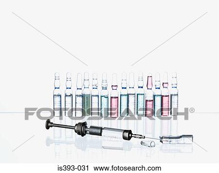 Syringe and medicine bottles View Large Photo Image Stock Image - Syringe and medicine bottles. Fotosearch