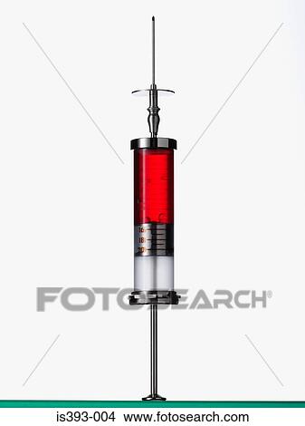 Picture - Syringe containing red liquid. Fotosearch