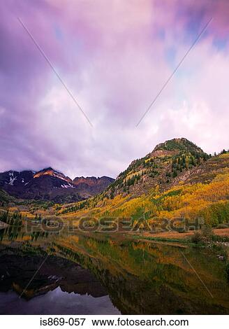 The maroon bells reflecting in maroon lake View Large Photo Image Stock Photo - The maroon bells reflecting in maroon lake. Fotosearch