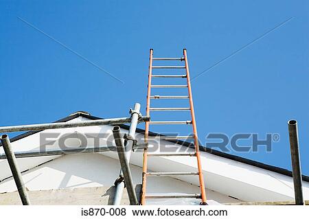 Ladder and scaffold on side of house View Large Photo Image Stock Photo - Ladder and scaffold on side of house. Fotosearch