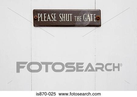 Stock Photography - Sign on a gate. Fotosearch