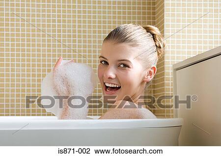 Woman bathing View Large Photo Image Stock Image - Woman bathing. Fotosearch