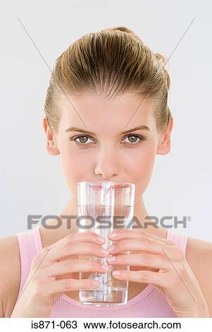 Stock Image - Woman drinking water. Fotosearch