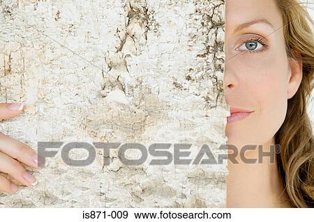 Woman holding bark View Large Photo Image Stock Photo - Woman holding bark. Fotosearch
