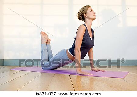 Stock Photo - Woman in yoga position. Fotosearch