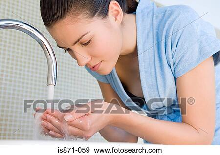 Woman washing hands View Large Photo Image Stock Photo - Woman washing hands. Fotosearch