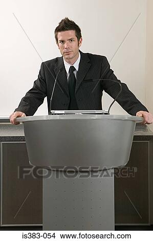 Picture - Businessman giving a presentation. Fotosearch