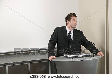 Stock Photo - Businessman giving presentation. Fotosearch