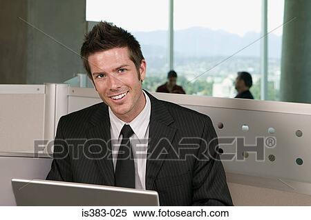Businessman using laptop View Large Photo Image Stock Photography - Businessman using laptop. Fotosearch