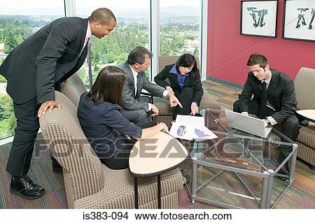 Businesspeople in a meeting View Large Photo Image Picture - Businesspeople in a meeting. Fotosearch